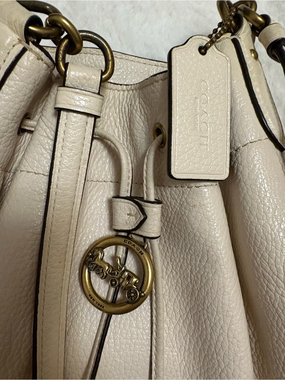 Coach Pebbled Leather Drawstring Shoulder Bag in Chalk